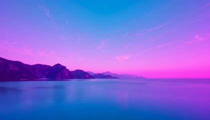 Tranquil ocean view at sunset with pink and blue sky