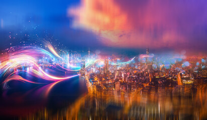 A vibrant cityscape is illuminated by glowing streaks of light against a colorful sunset.