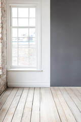 Fototapeta premium Bright and airy room with a large window and neutral walls, perfect for interior design ideas