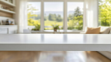 Fototapeta premium Blurred interior of stylish modern kitchen with massive straight white table for display.