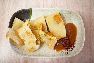 A popular breakfast dish in Taiwan known as Taiwanese egg pancakes.