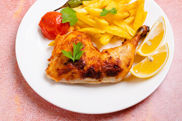 Chicken leg and fries 
