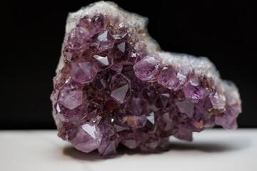 Close up photo of a beautiful and vibrant purple amethyst.