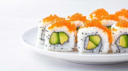Sushi platter with roe and avocado, elegant white plate, focus on detail