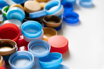 close up plastic bottles caps for recycling to conserve the environment, recycling, reuse, garbage disposal, save the world concept