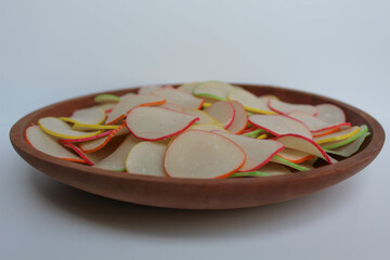 Kerupuk bawang pelangi, or garlic crackers with rainbow edge, from Indonesia. Before cooked. On...