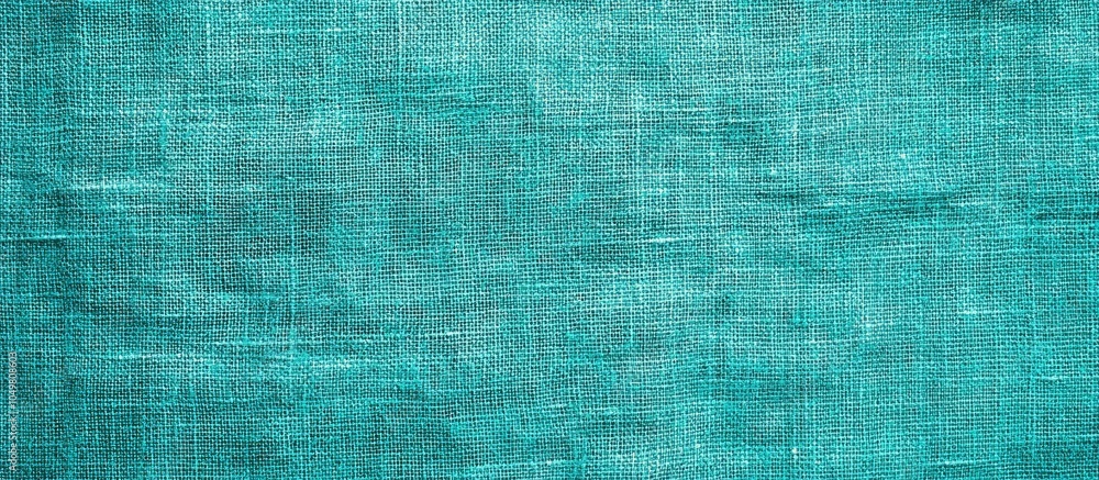 Fototapete Coarse turquoise canvas fabric cloth burlap sack texture Close up of a rough grunge background or wallpaper Beautiful web banner square image. with copy space image. Place for adding text or design