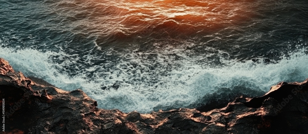 Poster stunning view of ocean water and dark lava sand. with copy space image. place for adding text or des