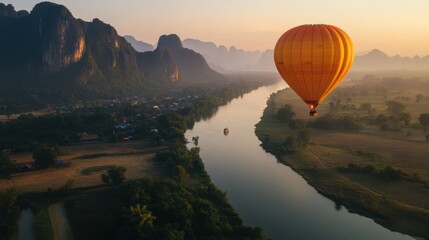 A serene hot air balloon ride over Vang Vieng, offering a bird eye view of the stunning karst