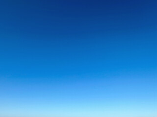 Sky gradient. Bright blue summer cloudless sky on a sunny day, sky blue gradient, background, backdrop, desktop.