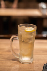 Japanese Whisky Highball in glass, is a mixed alcoholic drink composed of an alcoholic base spirit and a larger proportion of a non-alcoholic mixer, often a carbonated 