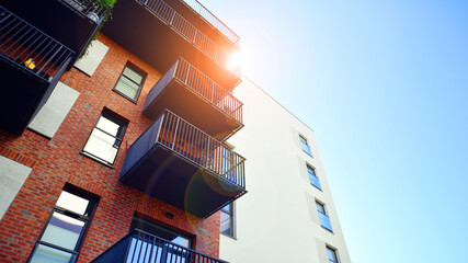 Modern multifamily building in a european city.  Walls made of concrete. Luxury house complex.