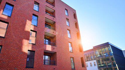 Modern multifamily building in a european city.  Walls made of concrete. Luxury house complex.