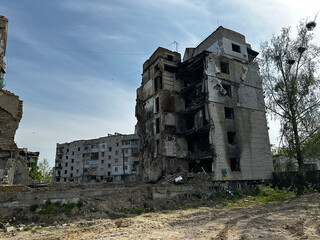 War-torn apartment blocks in Borodyanka, Ukraine, show severe structural damage from Russian...