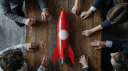 hands aroung a rocket