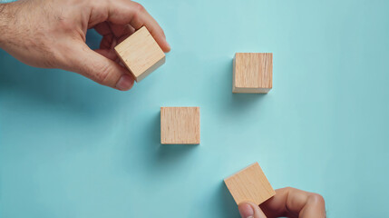 hands playing with wooden box