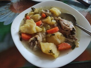 Boiled chicken with potatoes and vegetables