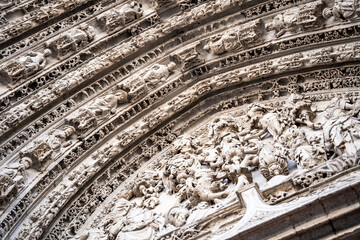 Detail on the facade of beautiful Rouen Cathedral also called Cathedral of Notre-Dame, in Gothic-style, richly decorated, Rouen city center, Normandy, France