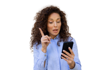 Happy Latina businesswoman texting on her smartphone