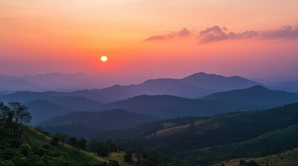 Obraz premium A beautiful sunset view from Phu Ruea, with the sky painted in shades of orange and pink