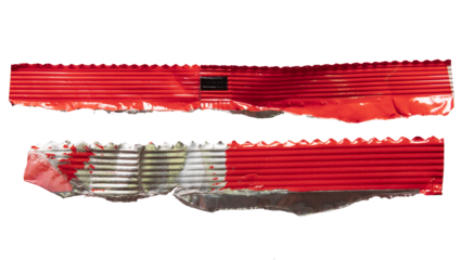 Torn Zig zag edge of red potato chips bag