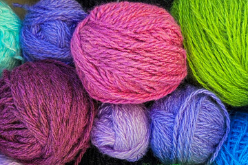 Vibrant Knitting Wool Background for DIY, emphasizing the warmth and joy of handmade crafts and inspires a cozy relaxed hobby