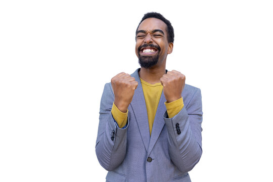 Young Black businessman cheering with clenched fists
