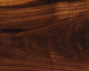 Texture of black walnut board with oil finish