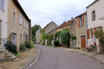 typical streets with old houses in Noyers sur Serein, France, Europe