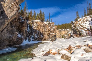 Winter landscape with mountains and frozen Lake.