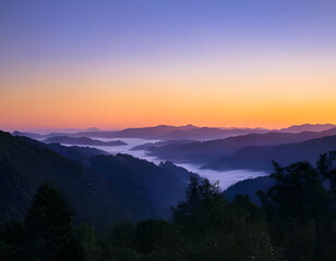 Obraz premium Sunrise over the misty valley, mountain landscape photography