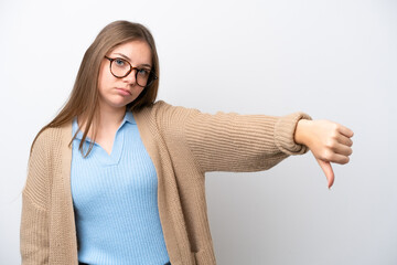 Young Lithuanian woman isolated on white background showing thumb down with negative expression
