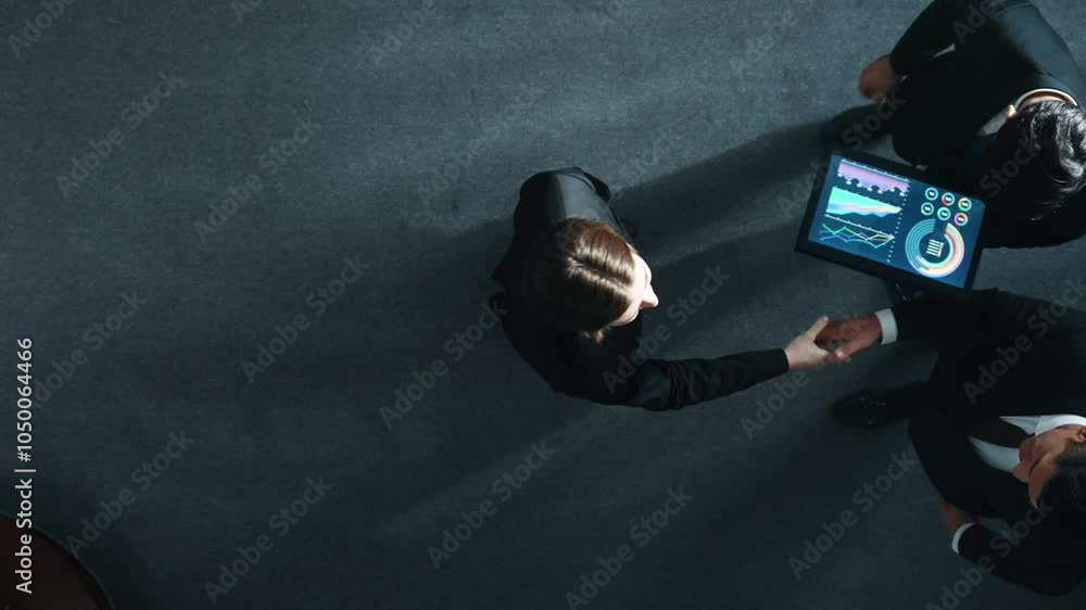 Poster top down aerial view of smart manager shaking hand with diverse team and analyze financial data from