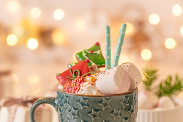 Cute and hot chocolate as perfect dessert for Christmas Eve.