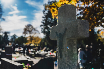 Cross in a Cemetery During All Saints' Day in Autumn in Poland