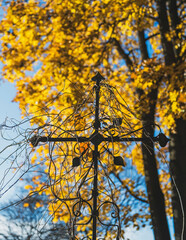 Cross in a Cemetery During All Saints' Day in Autumn in Poland