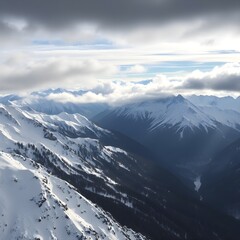 Naklejka premium Breathtaking view of the snowy mountains under the cloudy sky