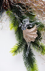 figurine of a ballerina girl on a Christmas tree. greeting card for ballerina