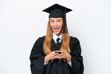 Young university graduate caucasian woman isolated on white background surprised and sending a...