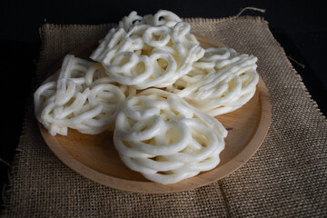 White crackers served in a wooden plate