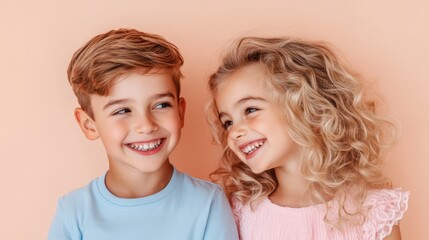 Two happy kids enjoying a playful moment together against a warm pastel background in a joyful atmosphere of friendship