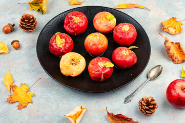 Concept of tasty food with baked apple.