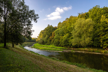 View of the Olza River at the beginning of autumn