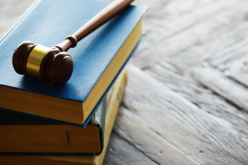 Judges gavel on wooden desk. Law firm concept.