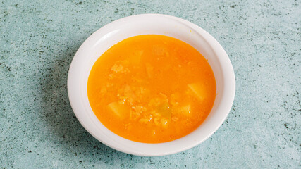 Lentil soup bowl isolated on white