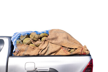 Pickup truck full of durians isolated on white