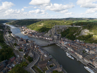 Fototapeta premium Dinant, Wallonia, Belgium, small city scape river Meuse, aerial drone view.