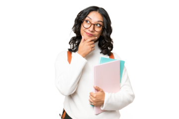 Young Argentinian student woman over isolated background and looking up