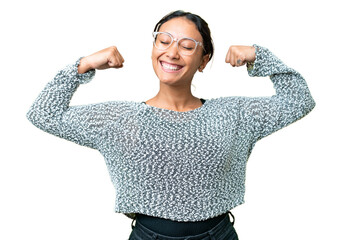 Young Uruguayan woman over isolated chroma key background doing strong gesture