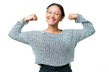 Young Uruguayan woman over isolated chroma key background doing strong gesture